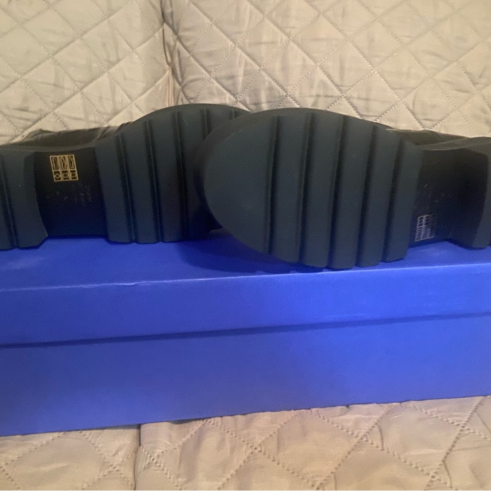 PRESLEY ULTRALIFT 
Stuart Weitzman black rain boots. Brand new in box.